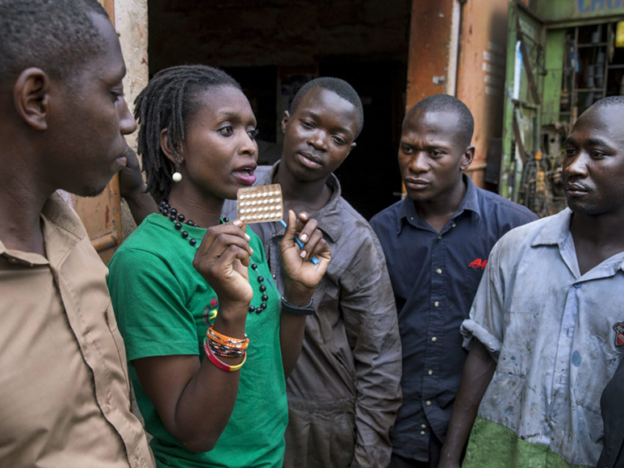 Male members of a youth club in Uganda during a family planning outreach activity.